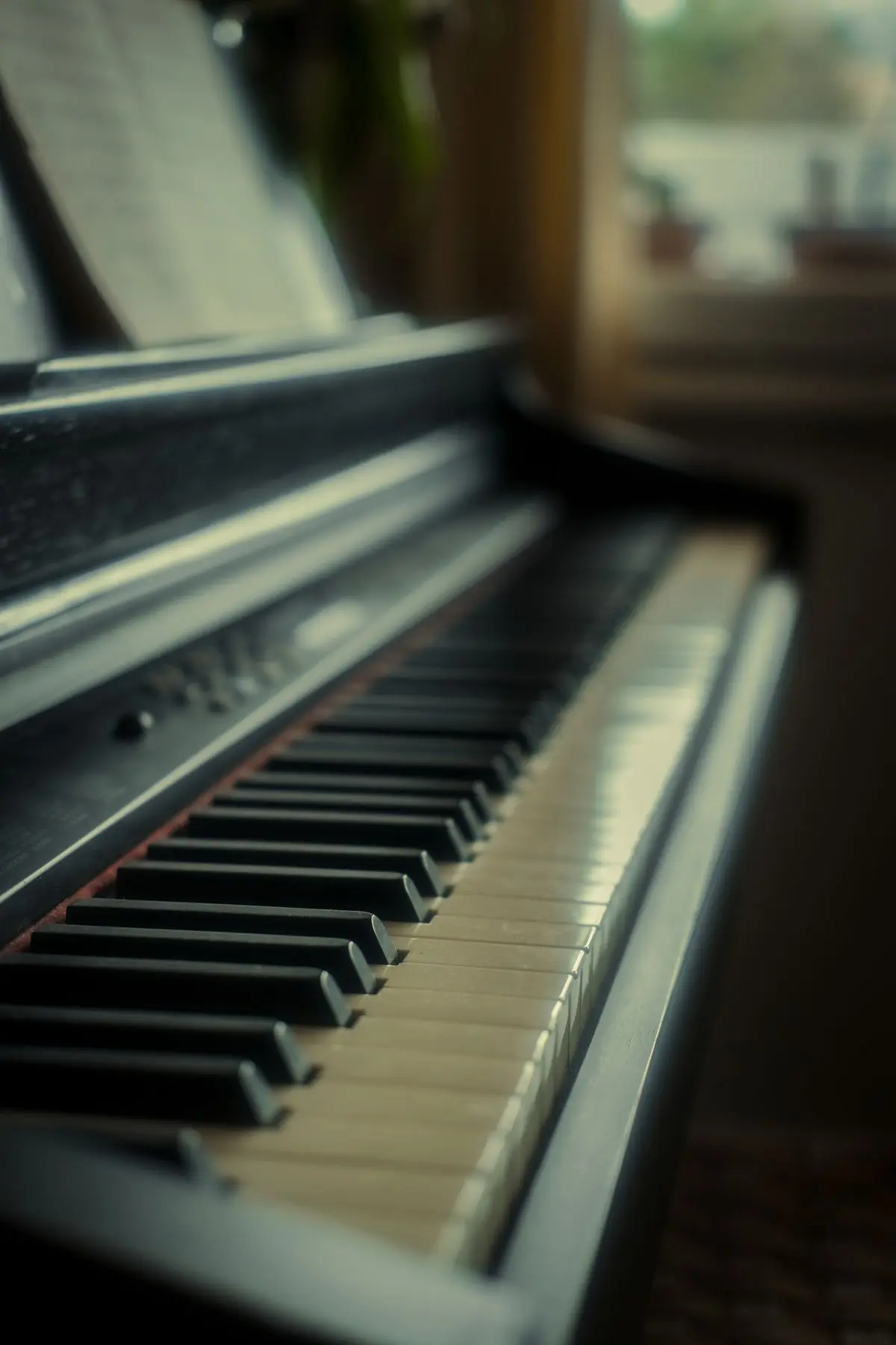 A keyboard instrument, representative of a 61-key portable keyboard.