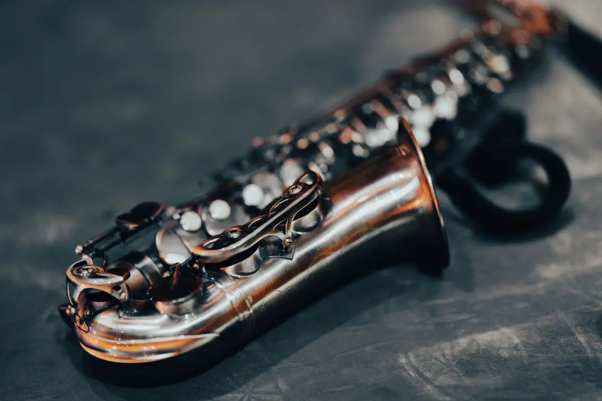 A woodwind instrument, representative of a alto saxophone.